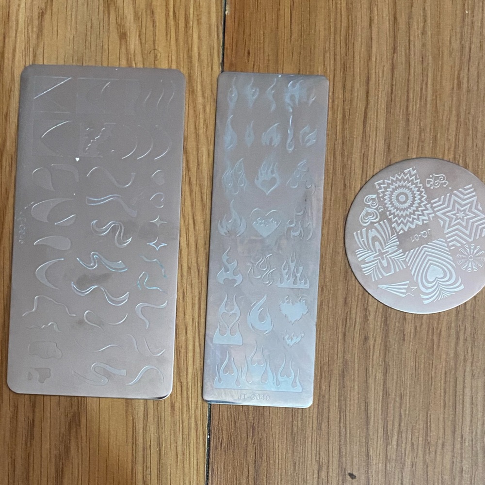 Nail art stamping plates
